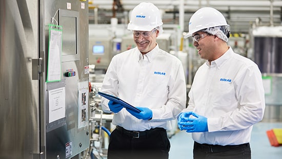 Two Ecolab Experts in a Food Processing facility